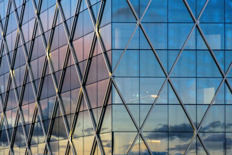 Commercial glazing facade built from architectural aluminum profiles machined for fenestration