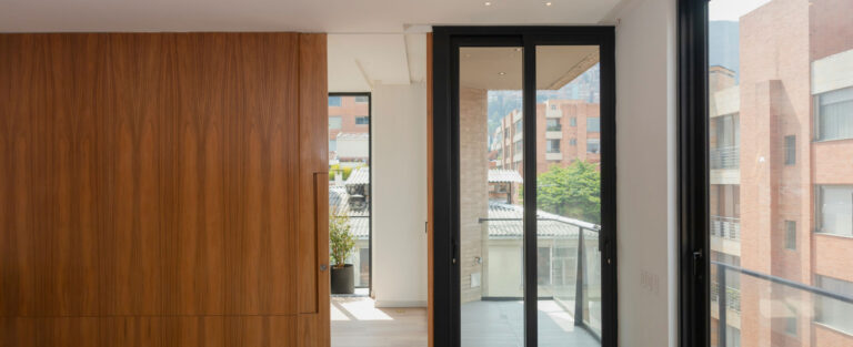 Finished interior and glazed doors produced with automated door frame fabrication equipment