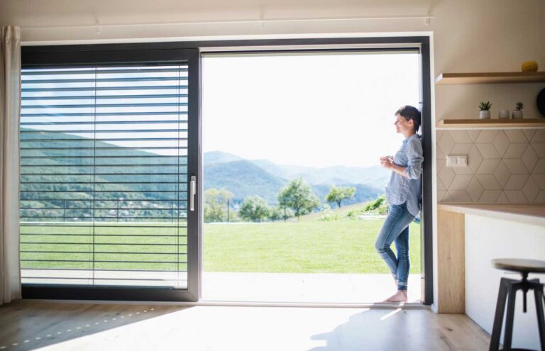 Sliding glass patio door made from extruded profiles cut and machined for patio door production